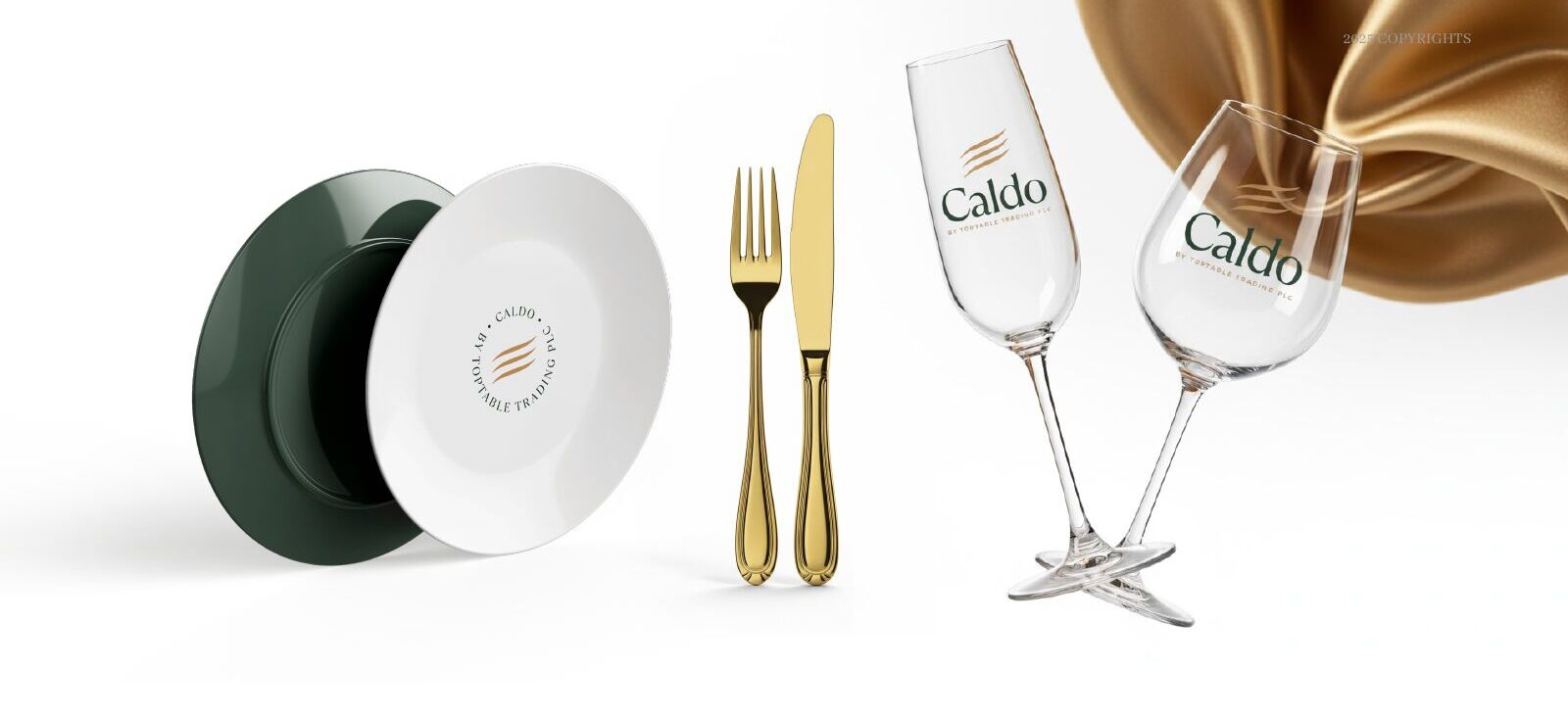 Caldo branded plate, gold cutlery and wine glasses